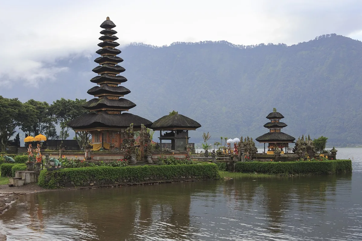 The tiered meru shrines of Pura Ulun Danu Bratan temple on the shore of Lake Bratan in Bali's highlands