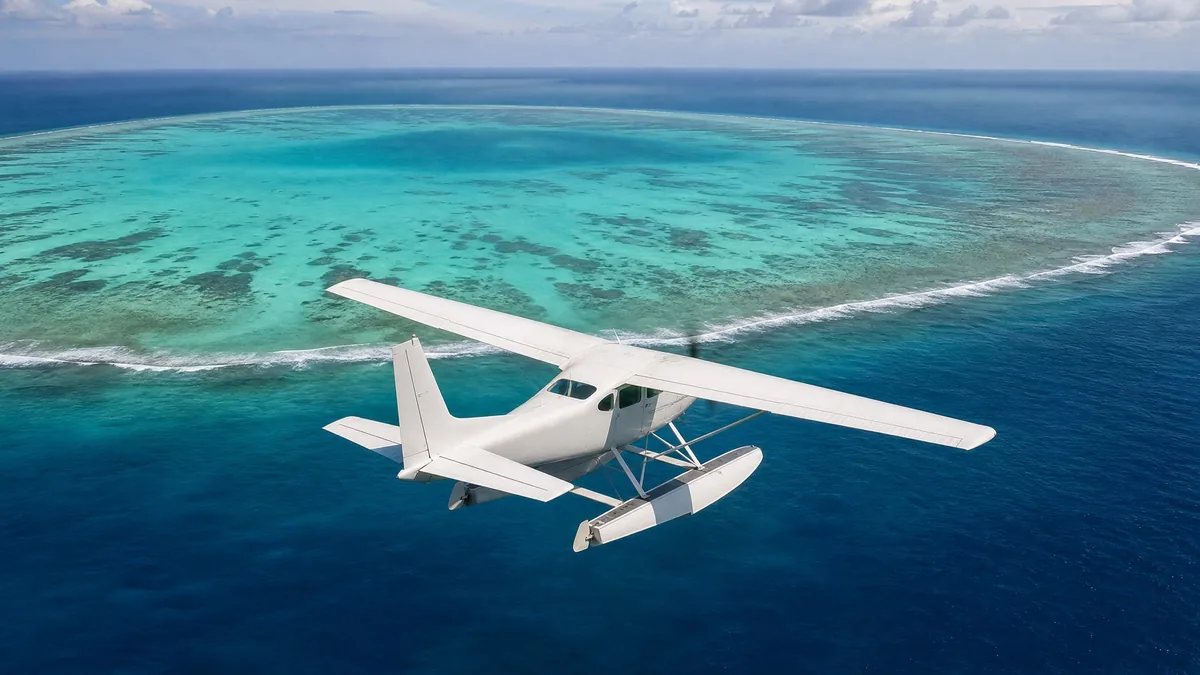 A small white floatplane